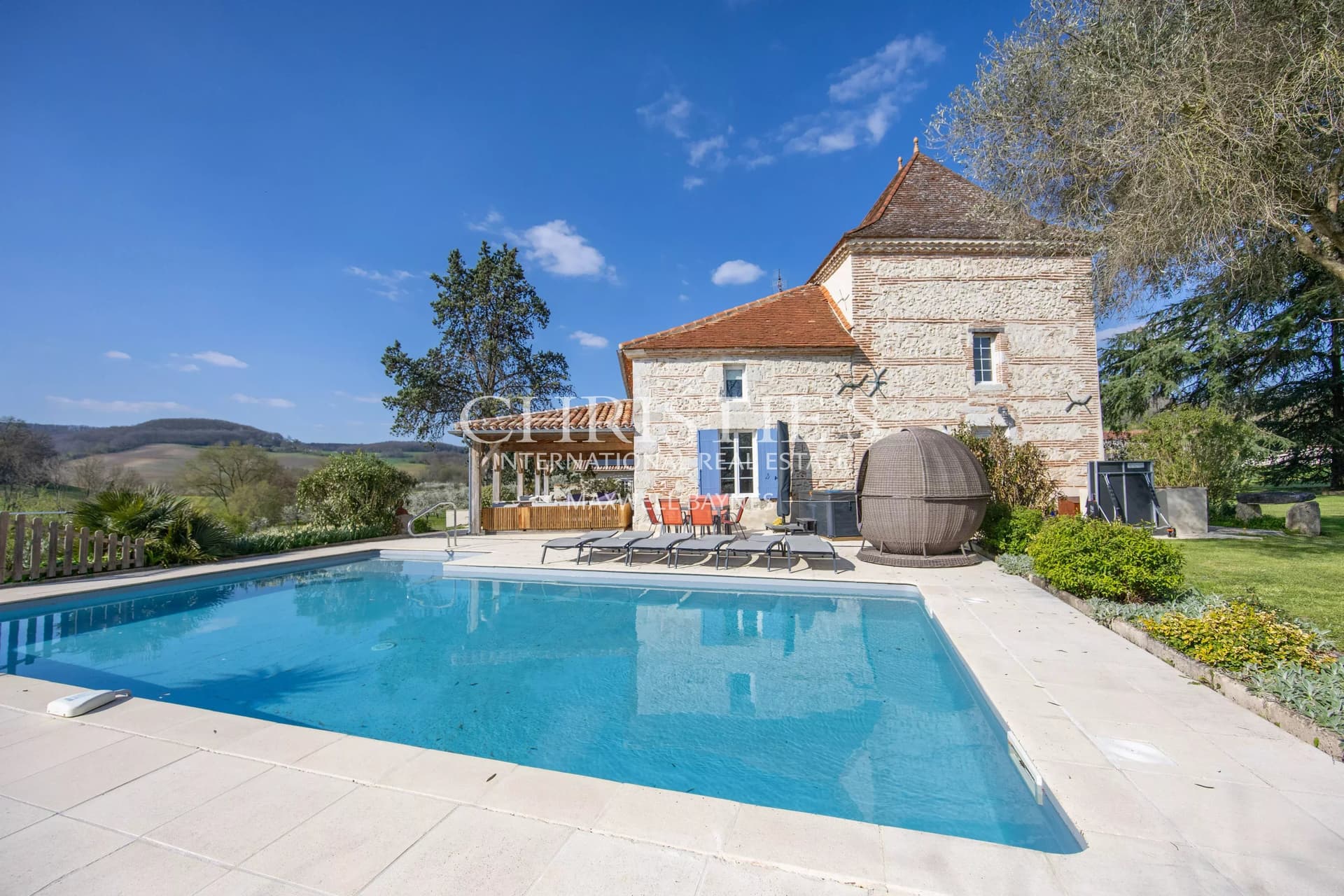 Charming Estate Comprised of Three Properties Nestled Near a Picturesque Riverside Village