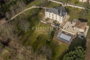 Exquisite "Folie" featuring a Heated Pool and Hobby Golf Course on the Banks of the River