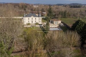 Exquisite "Folie" featuring a Heated Pool and Hobby Golf Course on the Banks of the River