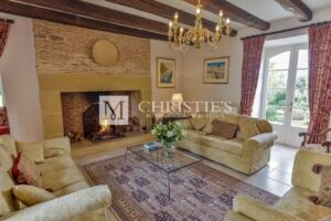 Living-room Chandelier Exposed bricks Wooden floor Fireplace Sliding windows