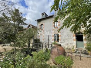 Charming mill house with guesthouse and gardens set in 4.25 hectares between Saumur and Angers