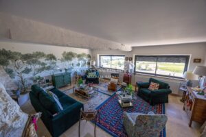 The Mill House, perched atop a hill, offers stunning and panoramic views