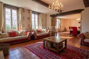 Stunning country manor house featuring beautiful gardens, a heated pool, and breathtaking views