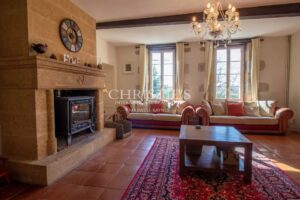 Stunning country manor house featuring beautiful gardens, a heated pool, and breathtaking views