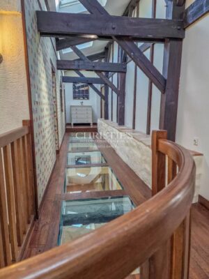 Stunning country manor house featuring beautiful gardens, a heated pool, and breathtaking views