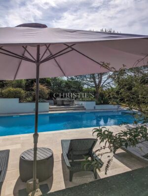 Stunning country manor house featuring beautiful gardens, a heated pool, and breathtaking views