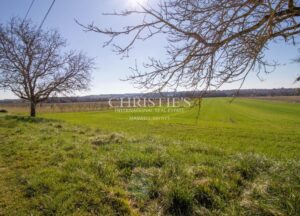 Stunning country manor house featuring beautiful gardens, a heated pool, and breathtaking views