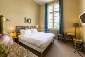 Large stone property with potential for a variety of uses in a private but central location in a lively Gascon town