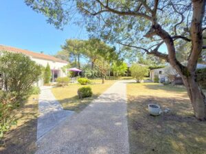 RARE Grand-Village : 1300 m² terrain + 2 maisons indép