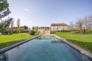 Enchanting Farmhouse with Unique Design Features and Attached Apartment on 4 Hectares of Parkland