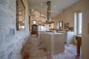 Enchanting Farmhouse with Unique Design Features and Attached Apartment on 4 Hectares of Parkland