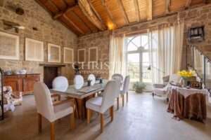 Enchanting Farmhouse with Unique Design Features and Attached Apartment on 4 Hectares of Parkland