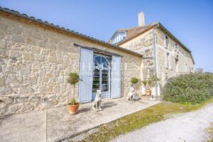 Enchanting Farmhouse with Unique Design Features and Attached Apartment on 4 Hectares of Parkland