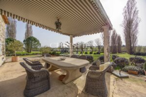 Enchanting Farmhouse with Unique Design Features and Attached Apartment on 4 Hectares of Parkland