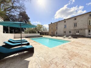 Character property with pool, outbuildings and enclosed land