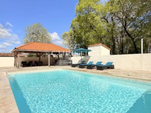 Character property with pool, outbuildings and enclosed land