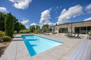 Contemporary Paradise: Sustainable Villa with Pool and Expansive Gardens