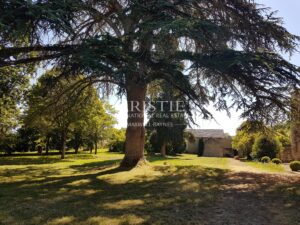 Elegant historic château in elevated position with wide ranging views of the Gers countryside