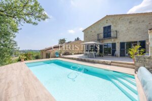 Haven of Peace Stone House, accompanied by a charming Guesthouse, nestled within 9.2 hectares of Diverse Land