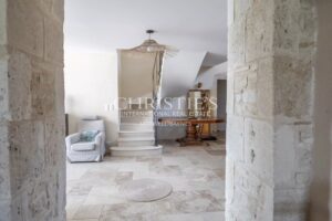Haven of Peace Stone House, accompanied by a charming Guesthouse, nestled within 9.2 hectares of Diverse Land
