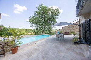 Haven of Peace Stone House, accompanied by a charming Guesthouse, nestled within 9.2 hectares of Diverse Land