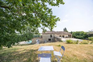 Haven of Peace Stone House, accompanied by a charming Guesthouse, nestled within 9.2 hectares of Diverse Land