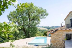 Haven of Peace Stone House, accompanied by a charming Guesthouse, nestled within 9.2 hectares of Diverse Land