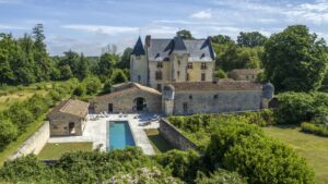 Exceptional 15th-Century ISMH Château : A Majestic Retreat set on a 93-Hectare Estate