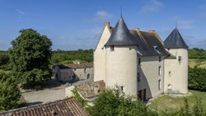 Exceptional 15th-Century ISMH Château : A Majestic Retreat set on a 93-Hectare Estate