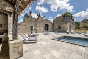 Exceptional 15th-Century ISMH Château : A Majestic Retreat set on a 93-Hectare Estate