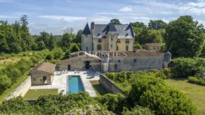 Exceptional 15th-Century ISMH Château : A Majestic Retreat set on a 93-Hectare Estate