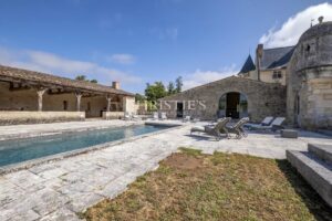 Exceptional 15th-Century ISMH Château : A Majestic Retreat set on a 93-Hectare Estate