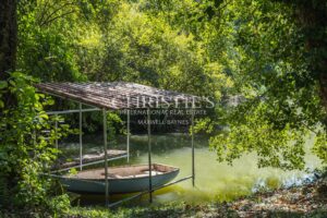 Four-bedroom country home with pool, lake and 1.77 hectares of mature gardens