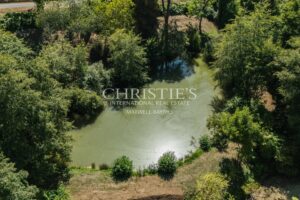 Four-bedroom country home with pool, lake and 1.77 hectares of mature gardens