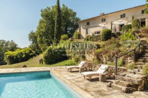 Four-bedroom country home with pool, lake and 1.77 hectares of mature gardens